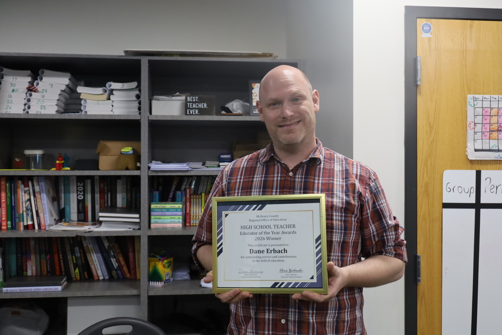 Dane Erbach Holding his High School Teacher Educator of the Year Awards 2026 certificate