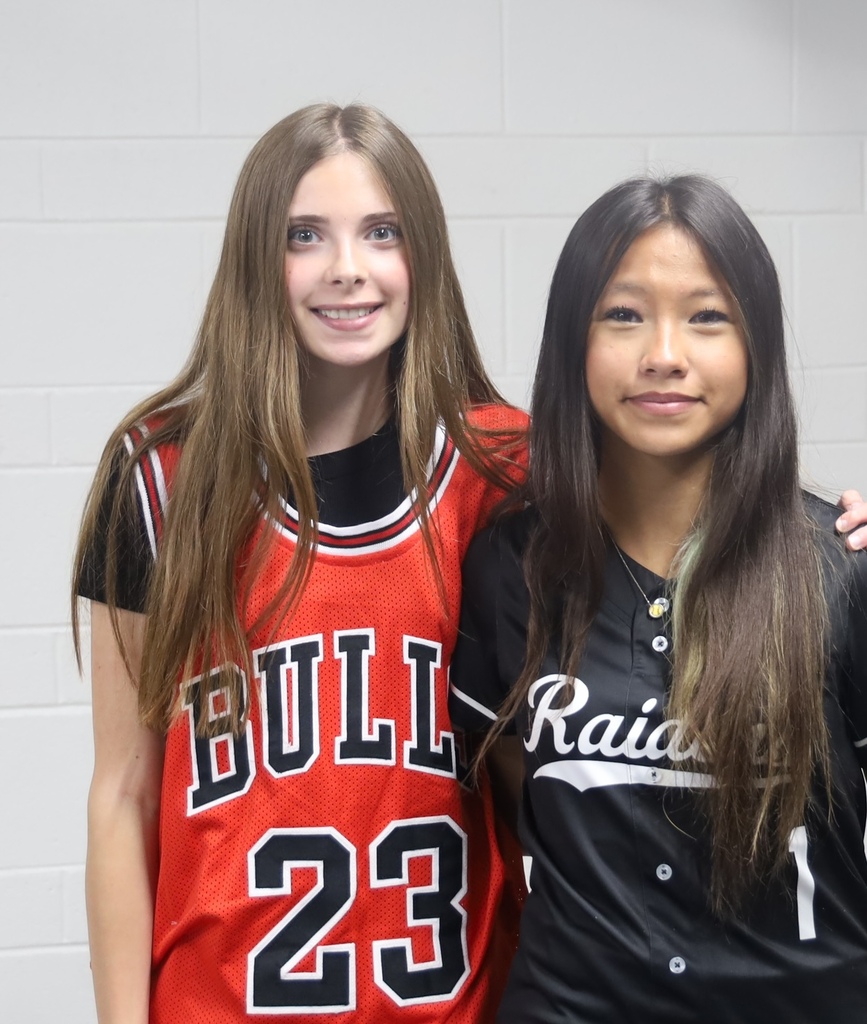 Two students in jerseys