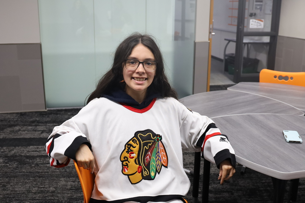 Student in Blackhawks jersey