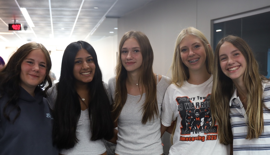 Five students posing