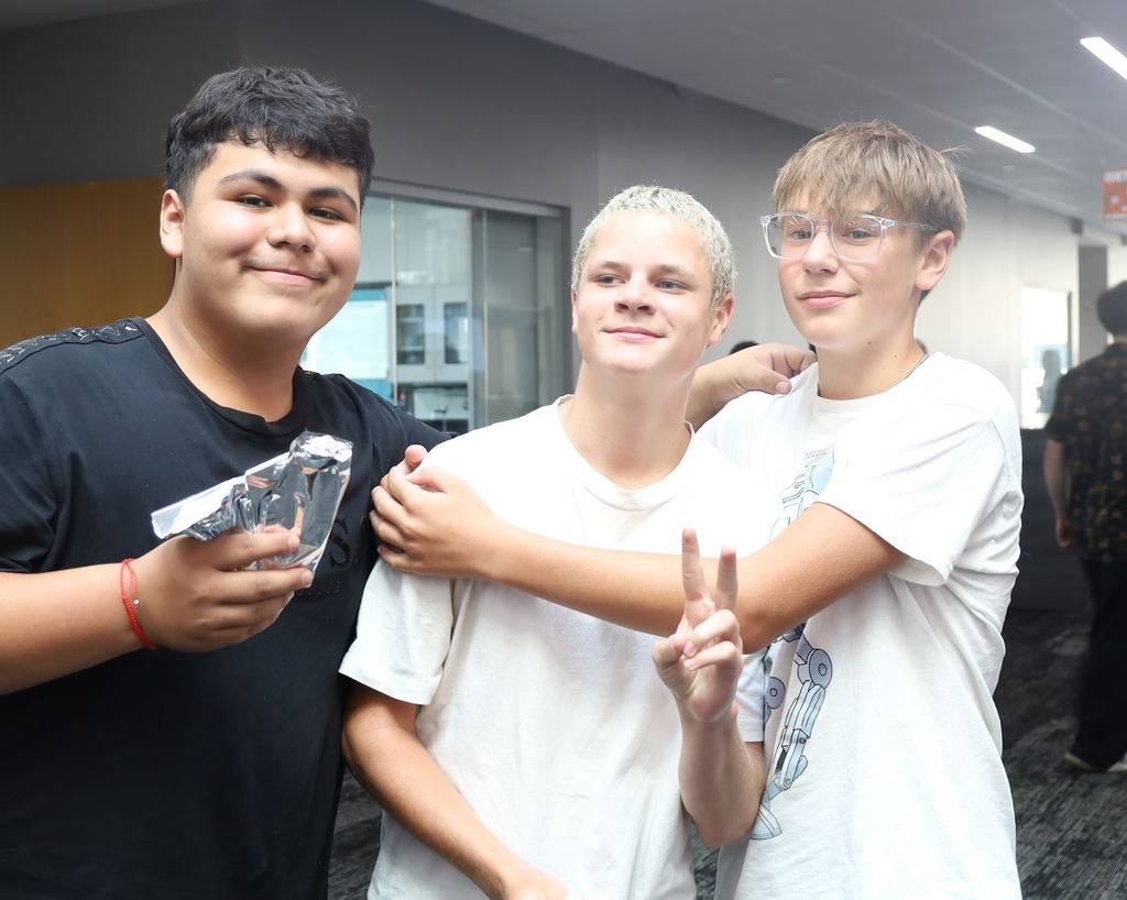 Three students posing