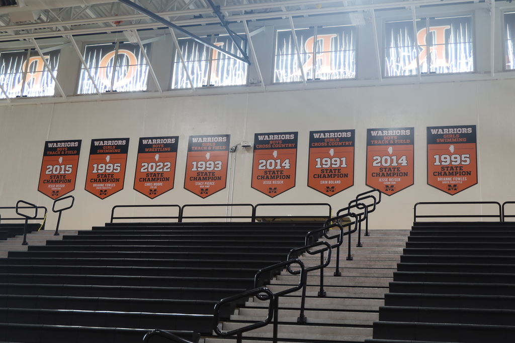 Banners in Upper campus gym Fox Valley Champs, Regional champs, sectional champs celebrations