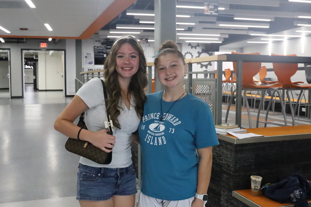 Two students posing 