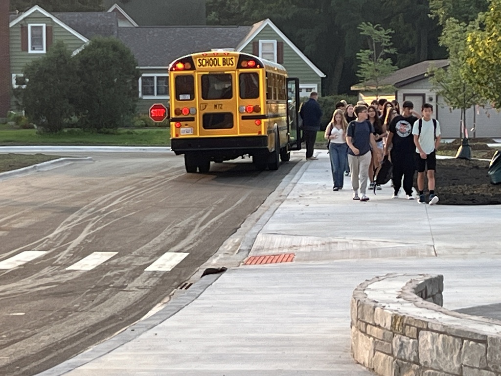 Students walking from the bus