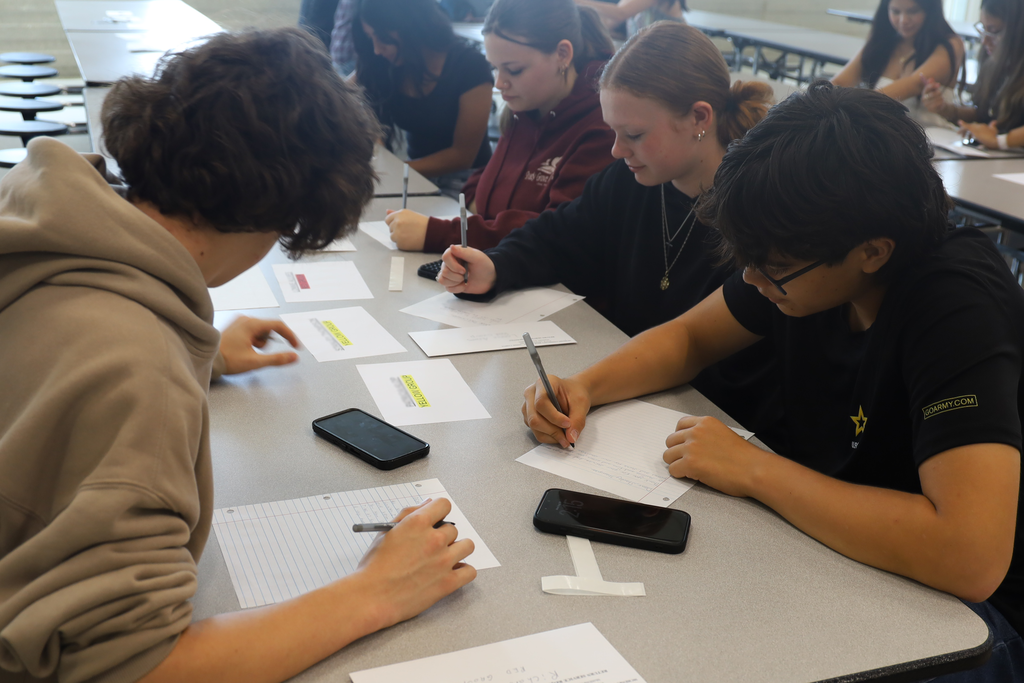 Students writing letters