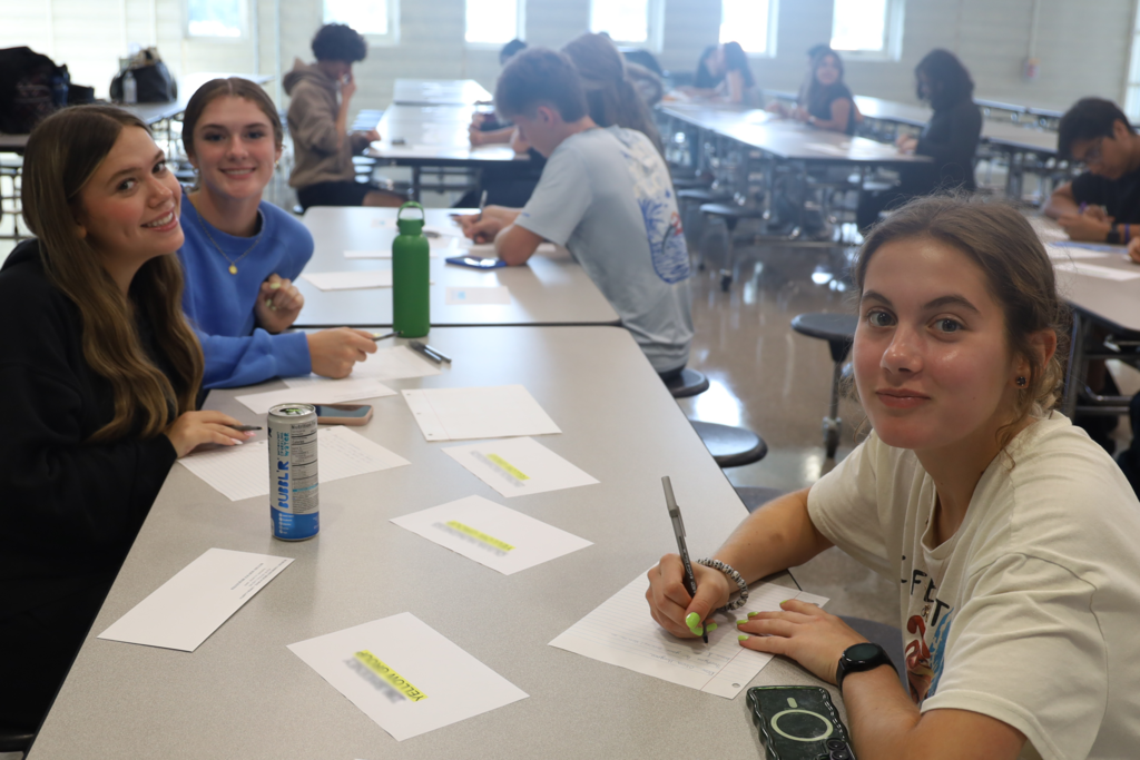 Students writing letters