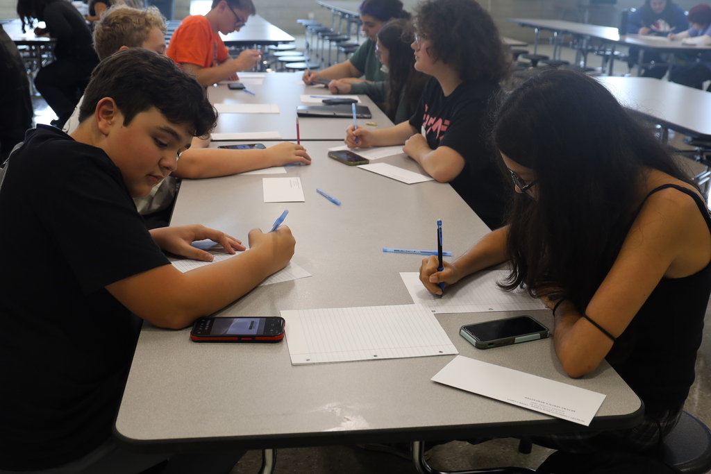Students writing letters