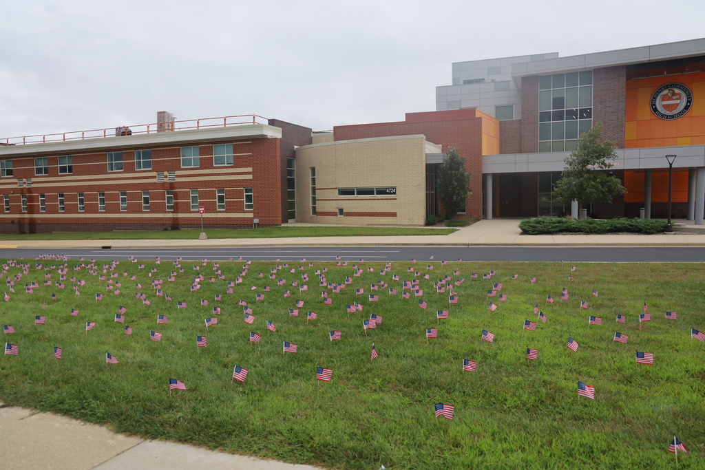 American flags in front of the school