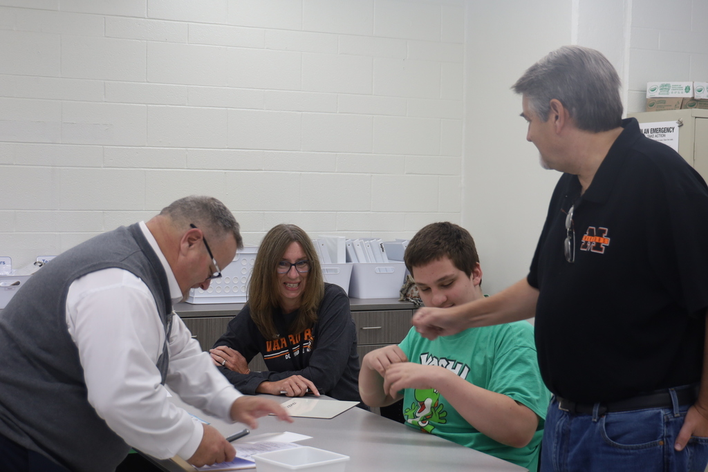 Mr. V signing contract