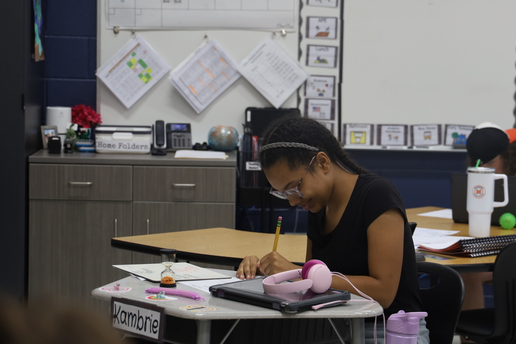 Student signing contract