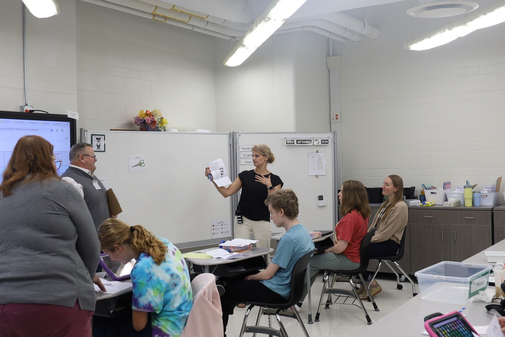 Ms. Hanson presenting contract to class