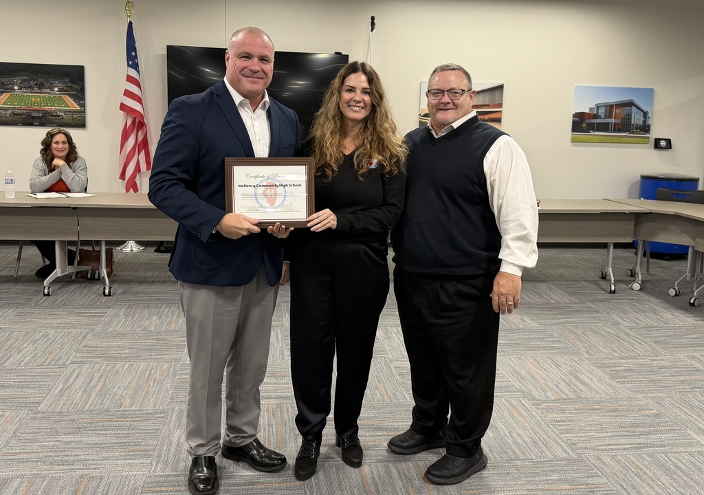 Dr. McTague and Carl Vallianatos with Diana Hartman holding plaque