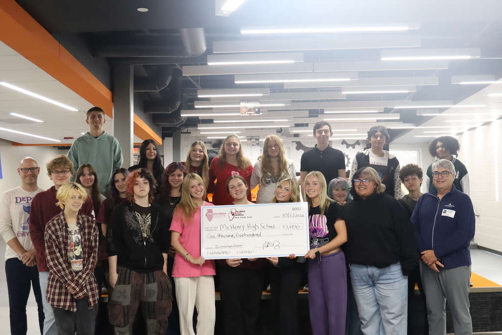 Photo of McHenry Messenger staff receiving a $1,500 grant from the Illinois Press Foundation