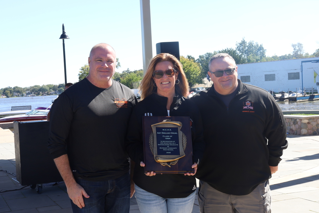 Mr. Vallianatos and Dr. Mctague with Amy Druml