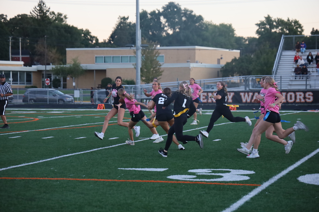Students running on the field