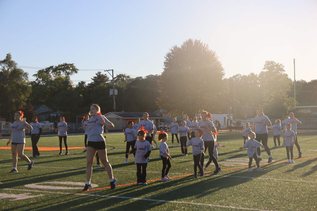 Dance on the field with junior dancers