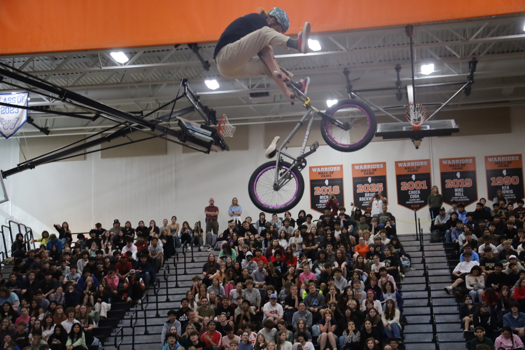 Biker in the air doing stunt 
