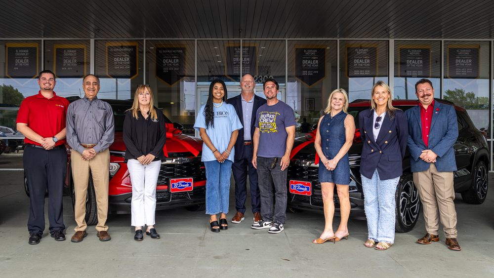 brannon and gillett in front of new cars at eldorado with MISD officials and Eldorado staff