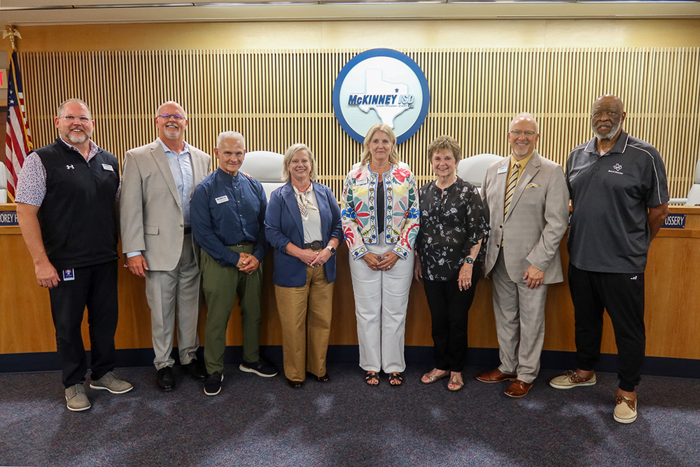 McKinney ISD Board of Trustees: (L–R) Trustee Corey Homer, Superintendent Shawn Pratt, Vice President Harvey Oaxaca, President Amy Dankel, Secretary Lynn Sperry, Trustee Kenneth Ussery, Trustee Larry Jagours