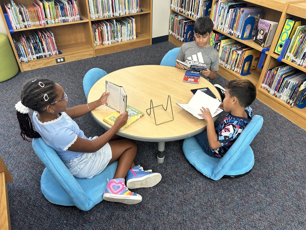 Reading in the library!