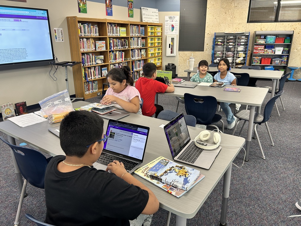 Reading in the library!