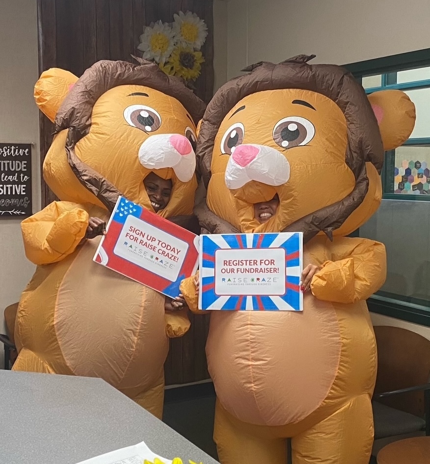 Roaring Start to the Press Fundraiser - Picture of Lion Costumes