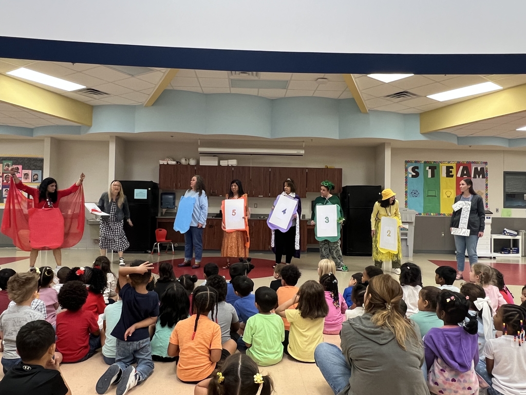 Administration team performing One by Kathryn Otoshi