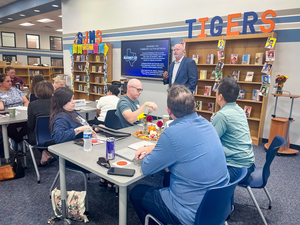 Shawn Pratt speaking to the group in the library
