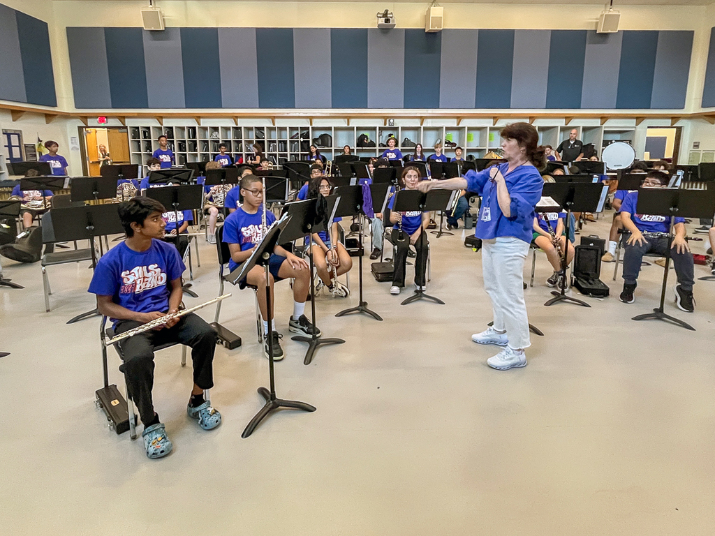 band members receiving instruction in the band hall