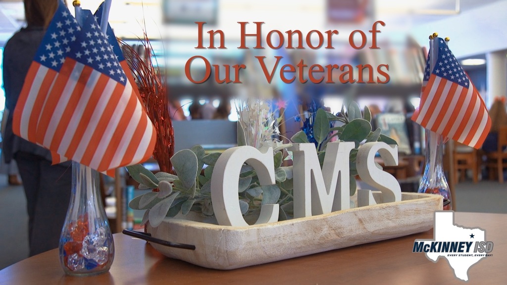 Picture of Cockrill Middle School library and graphic "In Honor of Our Veterans"