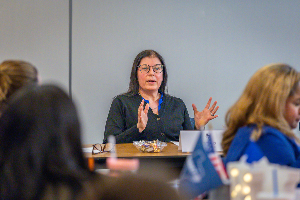 Panel participant Nikki Jo answers a question