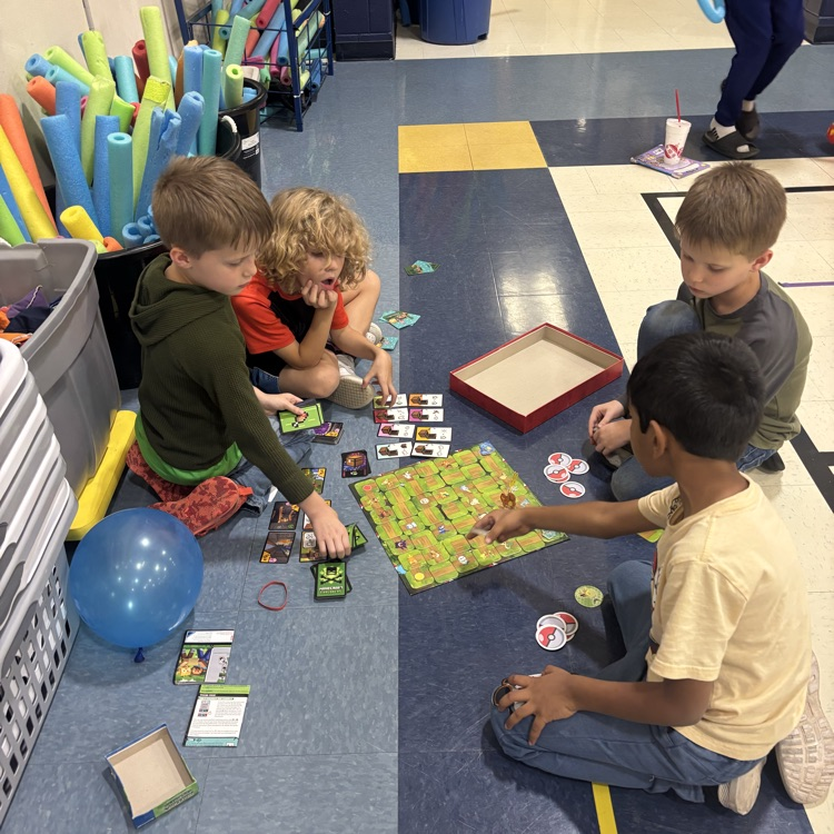 family playing a board game