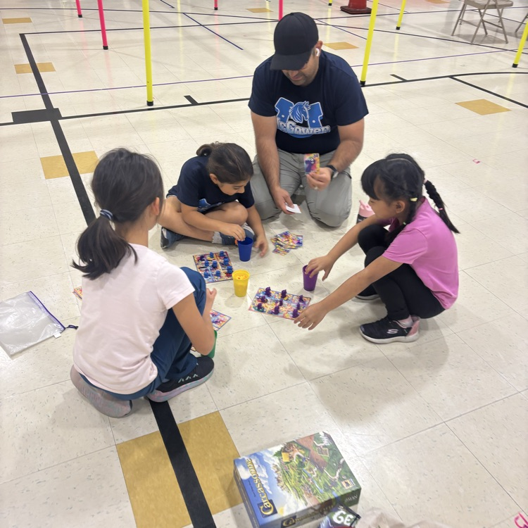 family playing a board game