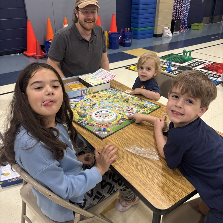 family playing a board game