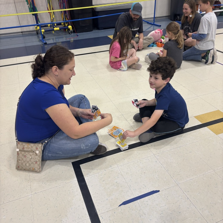 family playing a board game