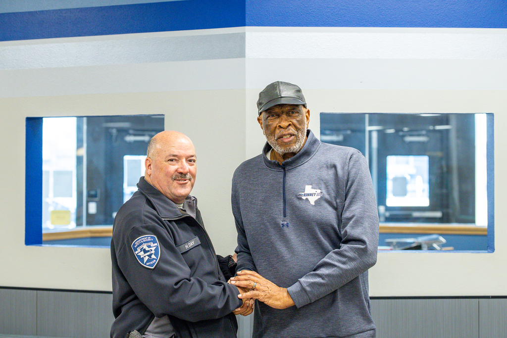 Larry Jagours shakes hands with the ASO at Slaughter
