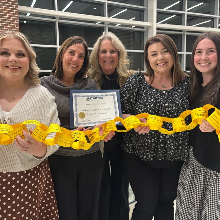 kinder team holding certificate for MISD Lives Kind Award