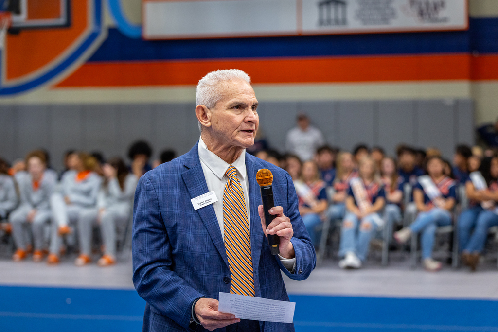 Oaxaca with mic speaking to the students