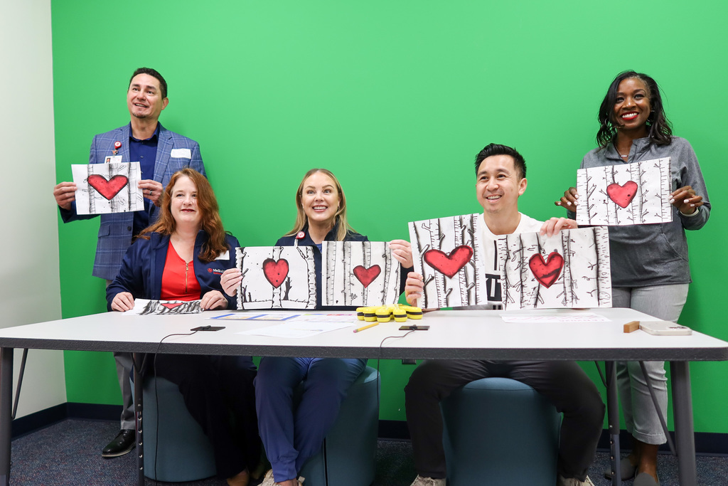 medical city staff join art teacher danh nguyen during the morning announcements at finch elementary 