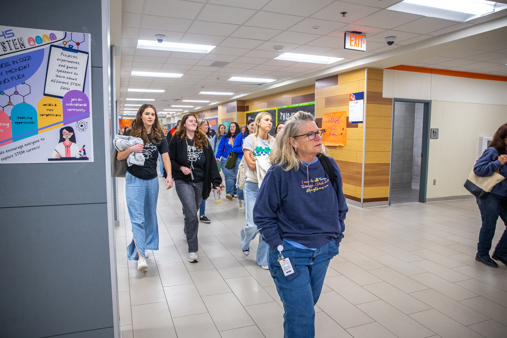 teachers walking down the hall at North to sessions