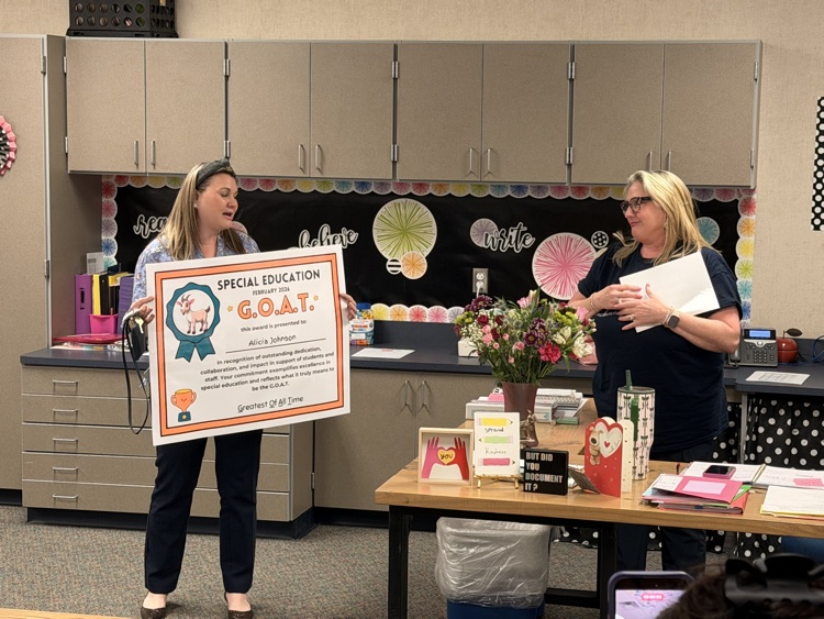 Mrs. Johnson receiving the Goat Award from our SPED Coordinator
