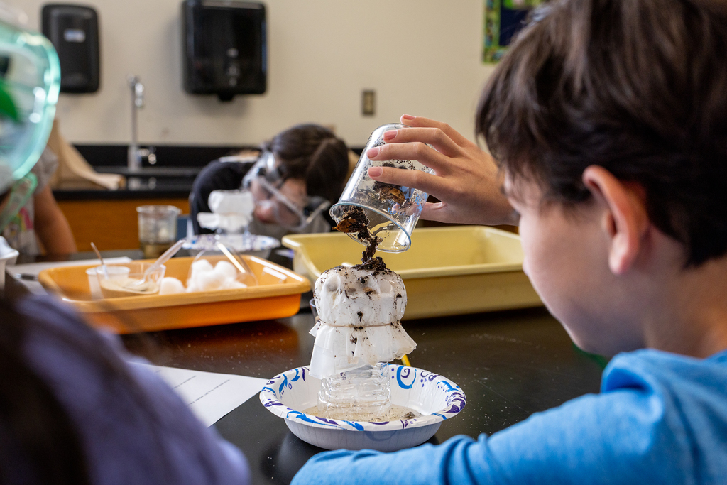 male student working on lab