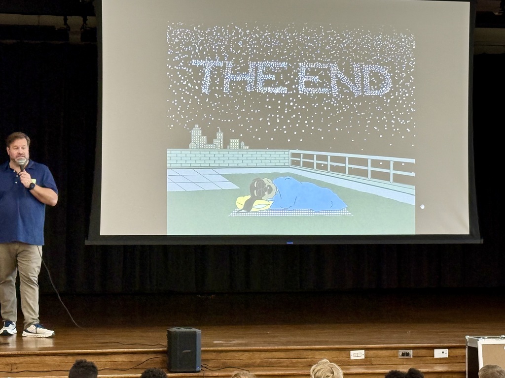 Author and Illustrator Jonathan Miller reading to students