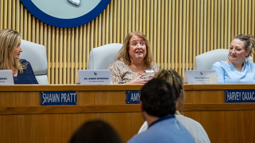 Holly Rogers seated and speaking during teacher panels