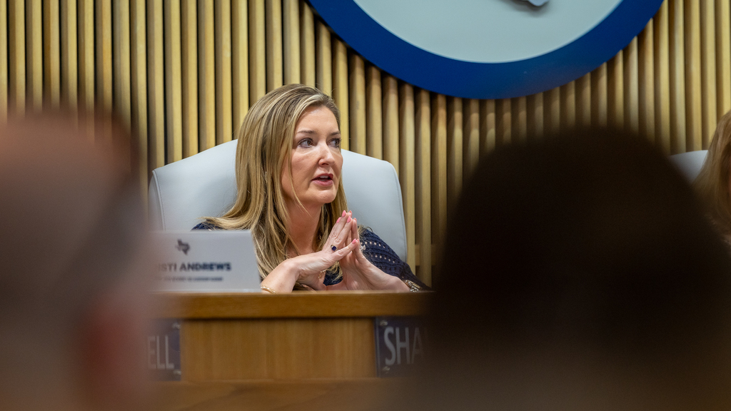 Amber Epperson seated and speaking during panel