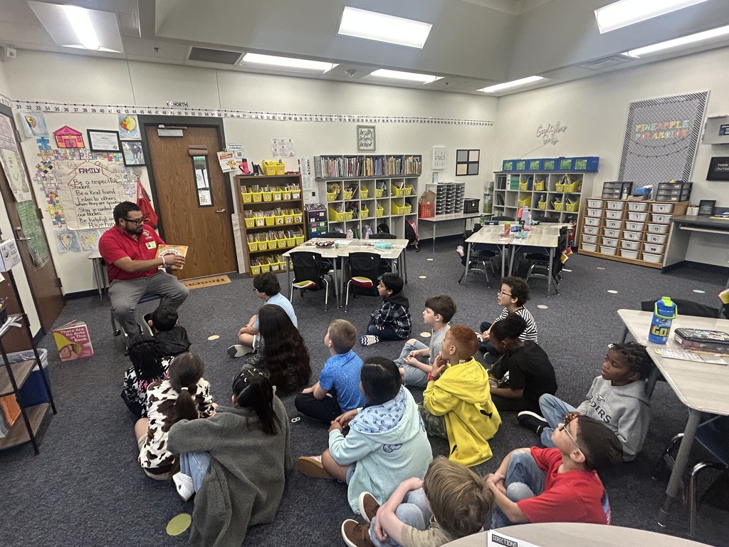 First Grade parent reading to a class to kickoff Read Across America.