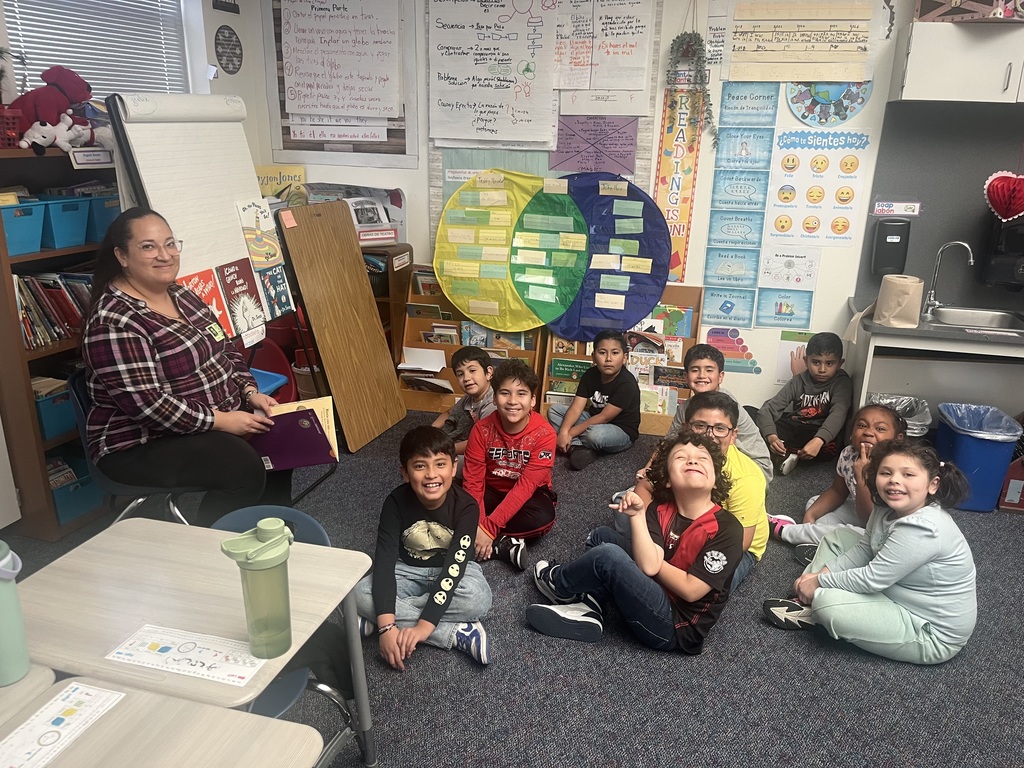 Second Grade parent reading to a class to kickoff Read Across America.