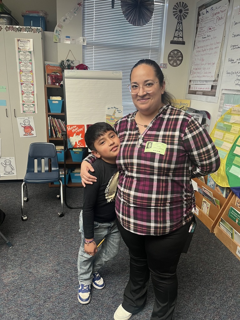 Second Grade parent reading to a class to kickoff Read Across America.