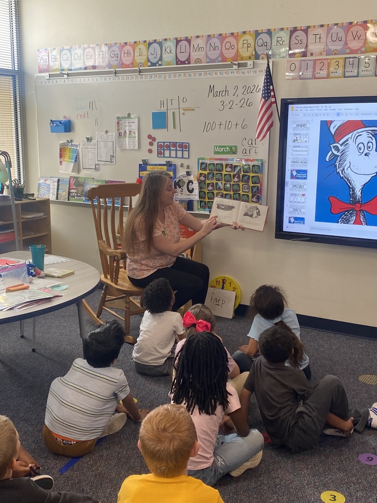Parent of a first grader kicking of Read Across America by reading to a class.