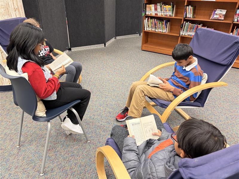 Reading in the library!